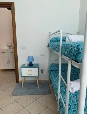 Letto o letti in una camera di Orchidea