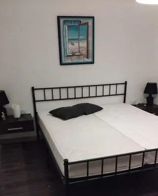 Letto o letti in una camera di Appartamento La Caletta