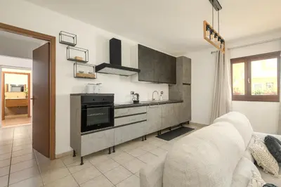 Cucina o angolo cottura di Zoe Apartment by Hotel Moderno