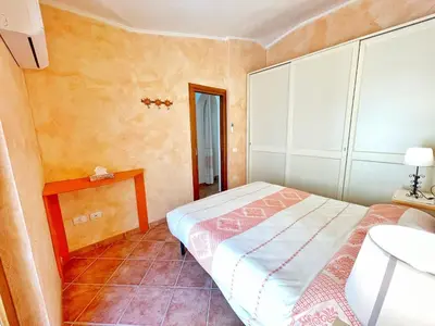 Letto o letti in una camera di Tra mare e natura, ogni comfort