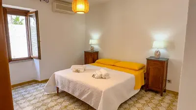 Letto o letti in una camera di Appartamento l'Anfora
