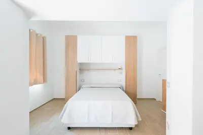 Letto o letti in una camera di Dimora Pacinotti