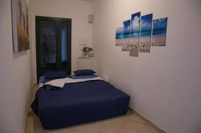 Letto o letti in una camera di La Pavoncella Marina - Cozy home near Porto Taverna