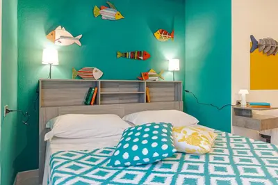 Letto o letti in una camera di Casa Anita-relax e comodità