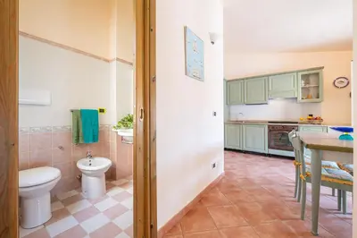 Cucina o angolo cottura di AffittaSardegna - Casa dei Pescatori