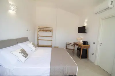 Letto o letti in una camera di Borgo Bianco affittacamere