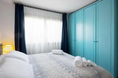 Letto o letti in una camera di Casa Laura al mare con piscina