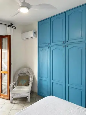 Letto o letti in una camera di Residenza estiva con giardino vista mare Santa Lucia