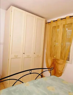 Letto o letti in una camera di Casa Aurora