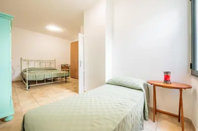 Letto o letti in una camera di AffittaSardegna - Domo Pineta