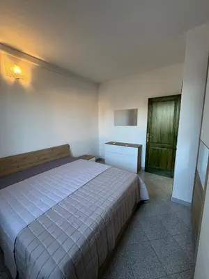 Letto o letti in una camera di Borgata Lu Fraili