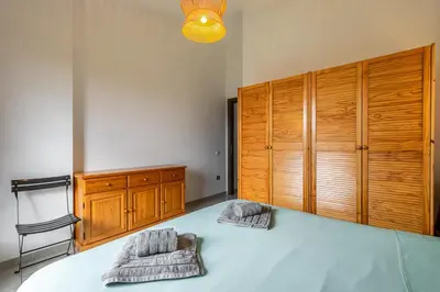 Letto o letti in una camera di Terrazza porto San Paolo