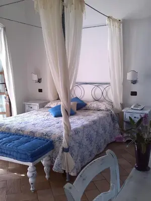 Letto o letti in una camera di Tenuta Le Terre 1927