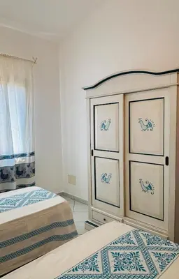 Letto o letti in una camera di La Pavoncella