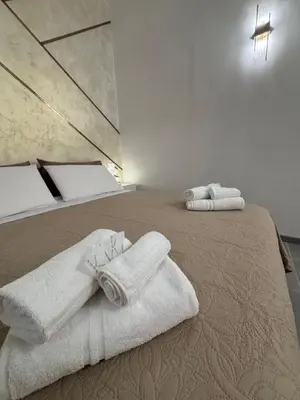 Letto o letti in una camera di Beddi Apartments B
