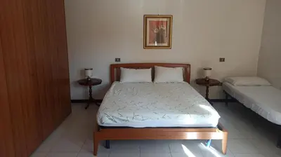 Letto o letti in una camera di Casa Artude
