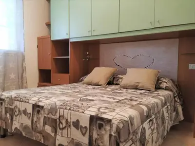Letto o letti in una camera di Casa Glicine