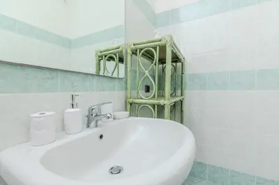Bagno di Delizioso Appartamento San Teodoro Lu Fraili