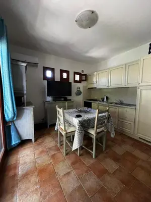 Cucina o angolo cottura di Relax in Olbia Apartment with Private Garden 2 Bedrooms