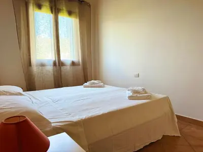 Letto o letti in una camera di White House Lu Impostu