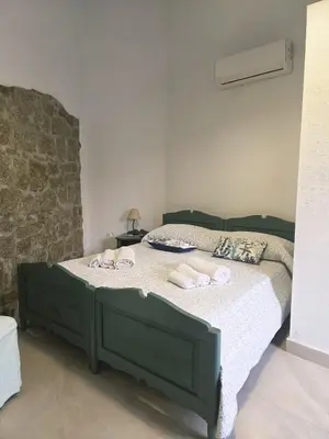 Letto o letti in una camera di Dimora Gallura