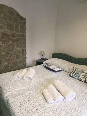 Letto o letti in una camera di Dimora Gallura