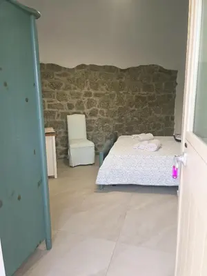 Letto o letti in una camera di Dimora Gallura