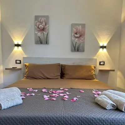 Letto o letti in una camera di B&B Magiulsà