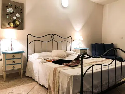 Letto o letti in una camera di CAMERA ECONOMY Piano Strada, Sas Tilibbas , Ammentos
