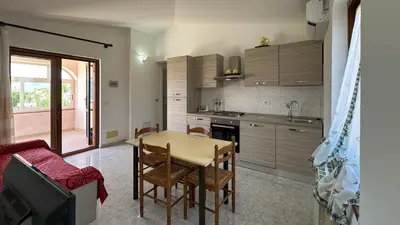 Cucina o angolo cottura di La Casa di Anna - Trilocale 6 posti letto San Teodoro