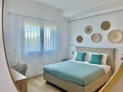 Letto o letti in una camera di Elis rooms & suite