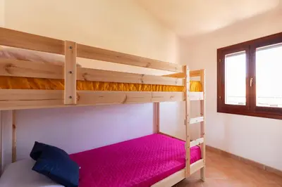 Letto o letti in una camera di Terrazza su Tavolara by Wonderful Italy