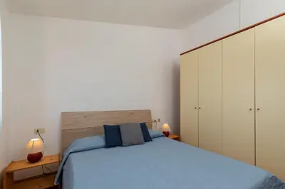 Letto o letti in una camera di Terrazza su Tavolara by Wonderful Italy