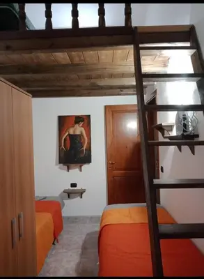 Letto o letti in una camera di Casa Sa Preta Ruja