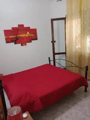 Letto o letti in una camera di Casa Sa Preta Ruja