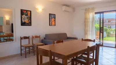 Area soggiorno di Casa Vacanza la Suaredda