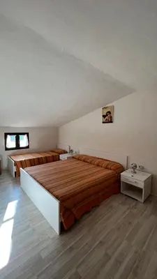 Letto o letti in una camera di Casa Tamerici