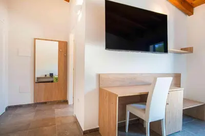 TV o dispositivi per l'intrattenimento presso Luxury Home La Cinta