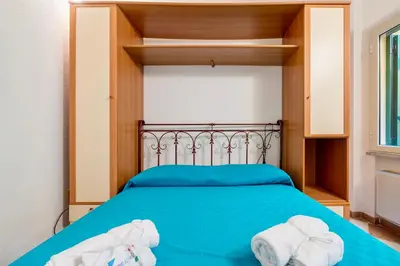 Letto o letti in una camera di House 8 beds overlooking a pine forest at just 600 mt from the sea