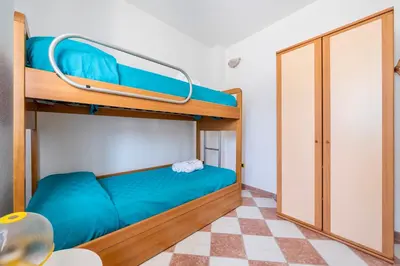 Letto o letti in una camera di House 8 beds overlooking a pine forest at just 600 mt from the sea