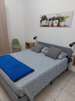 Letto o letti in una camera di Maria Pasqualina Vacation Home