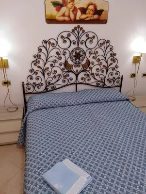 Letto o letti in una camera di Appartamento isa