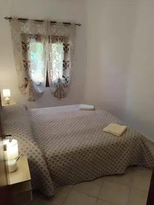 Letto o letti in una camera di Appartamento isa