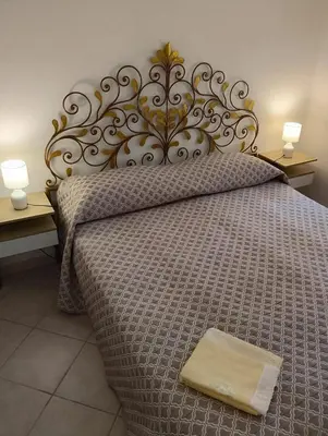 Letto o letti in una camera di Appartamento isa