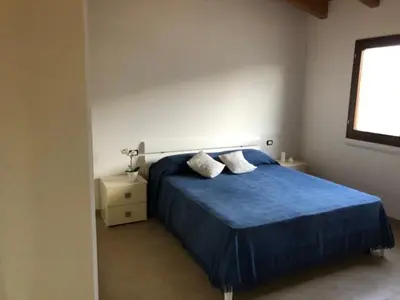 Letto o letti in una camera di Bilocale Smeraldo a pochi minuti dal mare