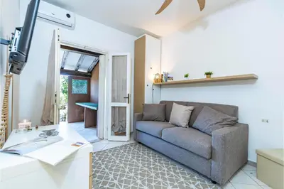 Area soggiorno di Il Vecchio Faro 19 - Happy Rentals