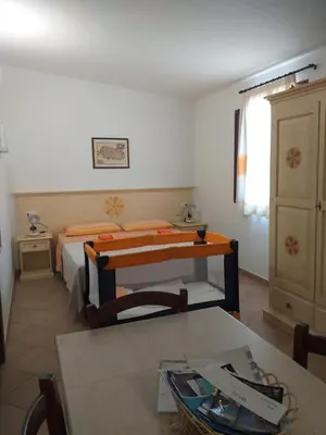 Letto o letti in una camera di Vistamare