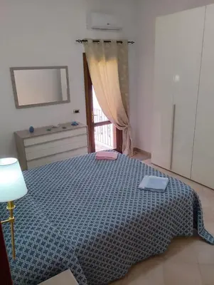 Letto o letti in una camera di Appartamento isa