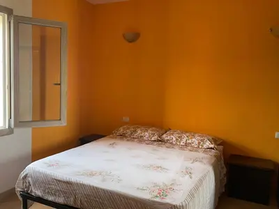 Letto o letti in una camera di Casa Rosanna