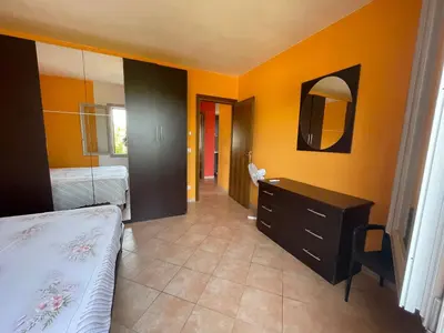 Letto o letti in una camera di Casa Rosanna